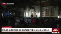 Police confront barricaded protesters at UCLA