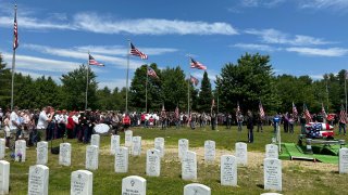 Former U.S. Marine Gerry Brooks is laid to rest Thursday, June 20, 2024 at the Maine Veterans Memorial Cemetery in Augusta.