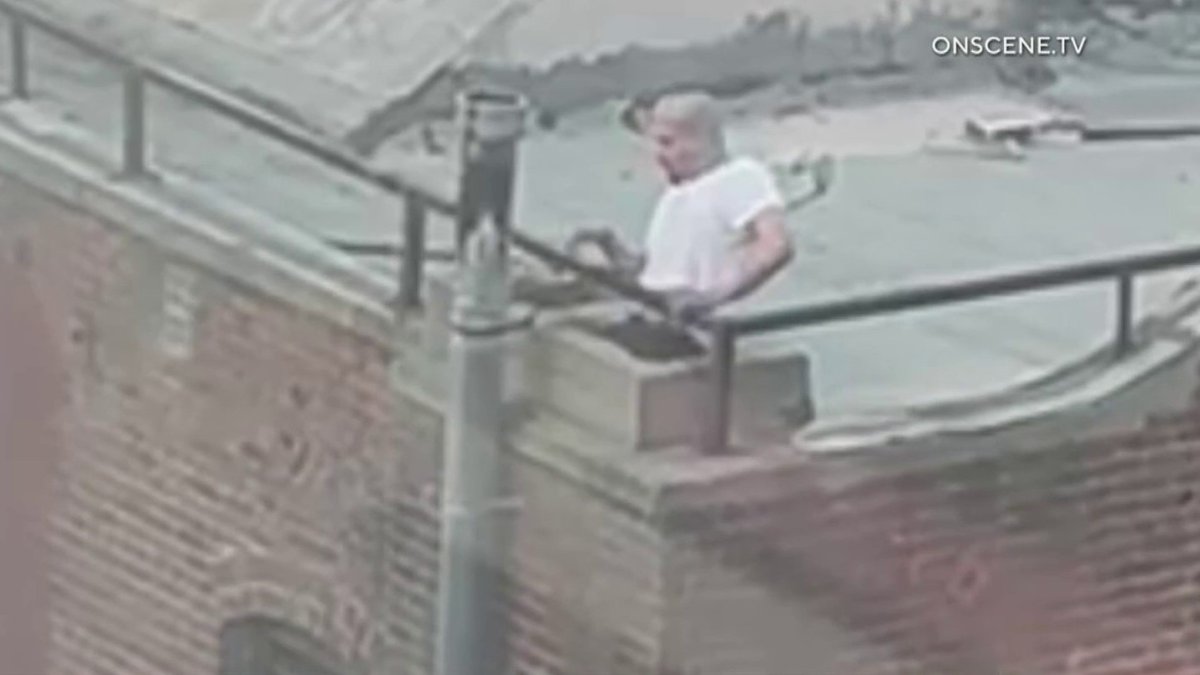 Watch: Firefighters rescue man stuck in downtown LA chimney – NBC Los ...