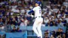 Dodgers blast four homers in 6th inning during 15-2 rout of reigning World Series champion Rangers