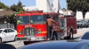 Video shows man punching firetruck during response to car crash
