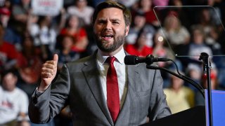 US Senate Republican candidate JD Vance speaks to attendees the stage at a rally held by former U.S. president Donald Trump in Youngstown, Ohio, September 17, 2022.