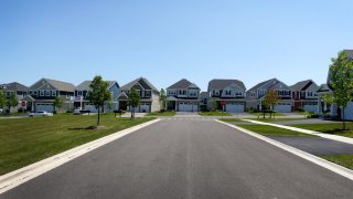 An aerial view shows a subdivision that has replaced the once rural landscape on July 19, 2023 in Hawthorn Woods, Illinois.