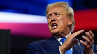 Republican presidential nominee and former U.S. President Donald Trump applauds on Day 2 of the Republican National Convention (RNC), at the Fiserv Forum in Milwaukee, Wisconsin, U.S., July 16, 2024.