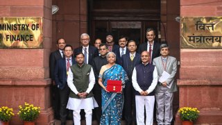 New Delhi, India – February 01: Finance minister, Nirmala Sitharaman, outside Finance Ministry on the Budget Day, with other members of Finance Ministry in New Delhi on February 01, 2024. (Photo by Hardik Chhabra/ The India Today Group via Getty Images)