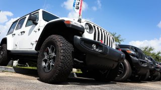 New Jeep vehicles sit on a Dodge Chrysler-Jeep Ram dealership’s lot on October 03, 2023 in Miami, Florida.