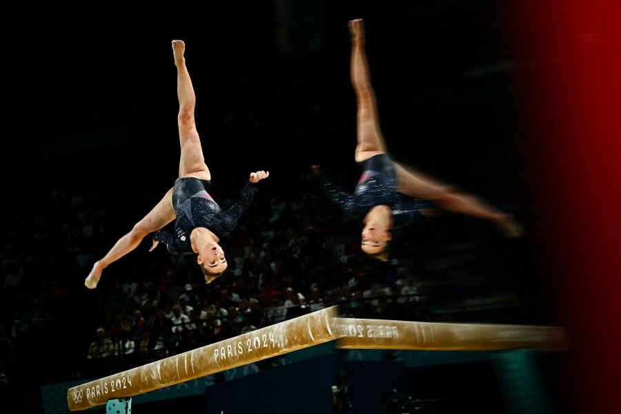 Britain's Alice Kinsella competes in the balance beam event of the artistic gymnastics