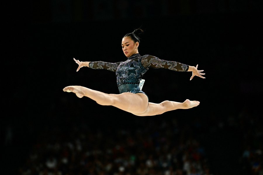 US' Sunisa Lee competes in the balance beam event of the artistic gymnastics women's qualification