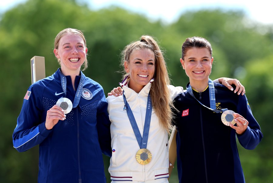 Gold medalist Pauline Ferrand Prevot of Team France (C), Silver medalist Haley Batten of Team United States (L) and Bronze medalist Jenny Rissveds of Team Sweden (R)