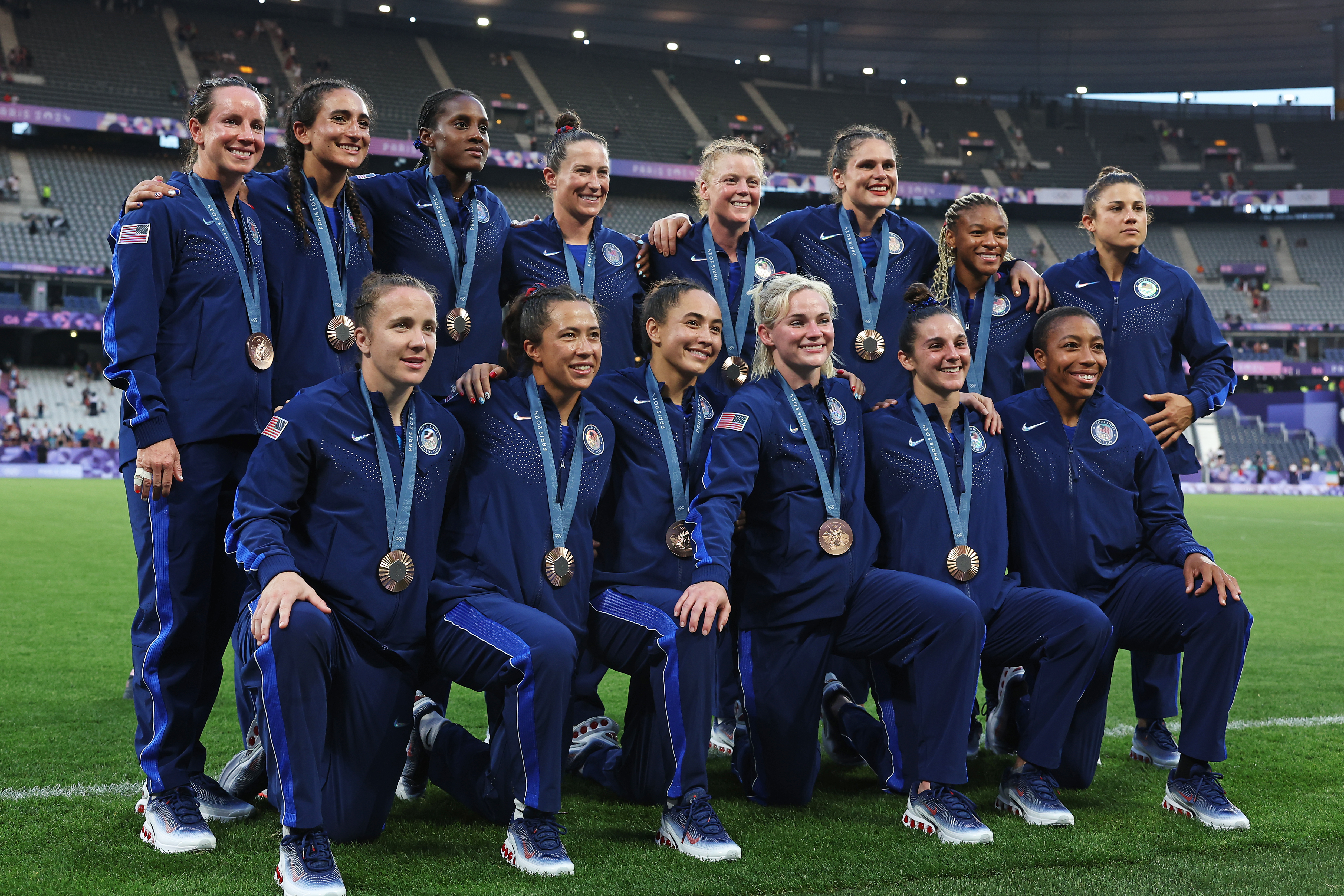 Bronze medalists of Team United States pose after the Women’s Rugby Sevens medal ceremony following the Women’s Rugby Sevens matches on day four of the Olympic Games Paris 2024 at Stade de France on July 30, 2024 in Paris, France. The team includes Kayla Canett, of Fallbrook.