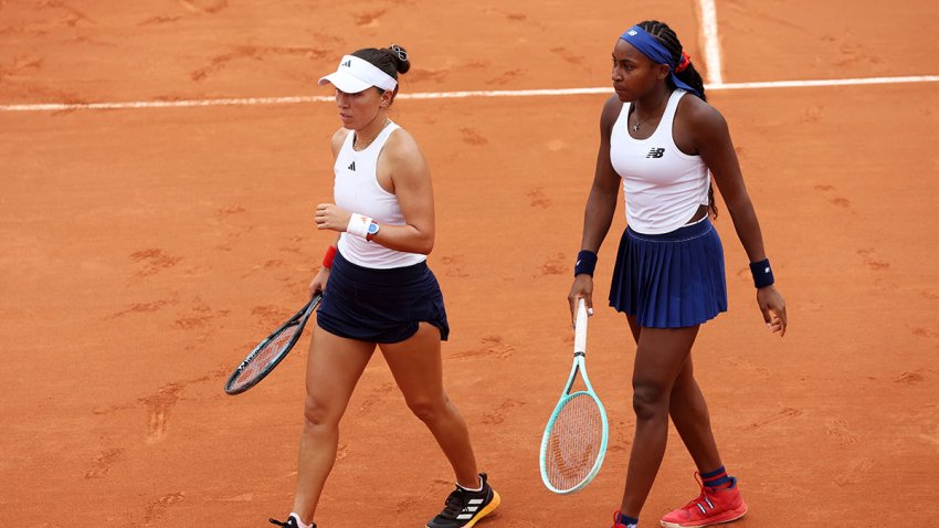 Coco Gauff of Team United States looks on with partner Jessica Pegula