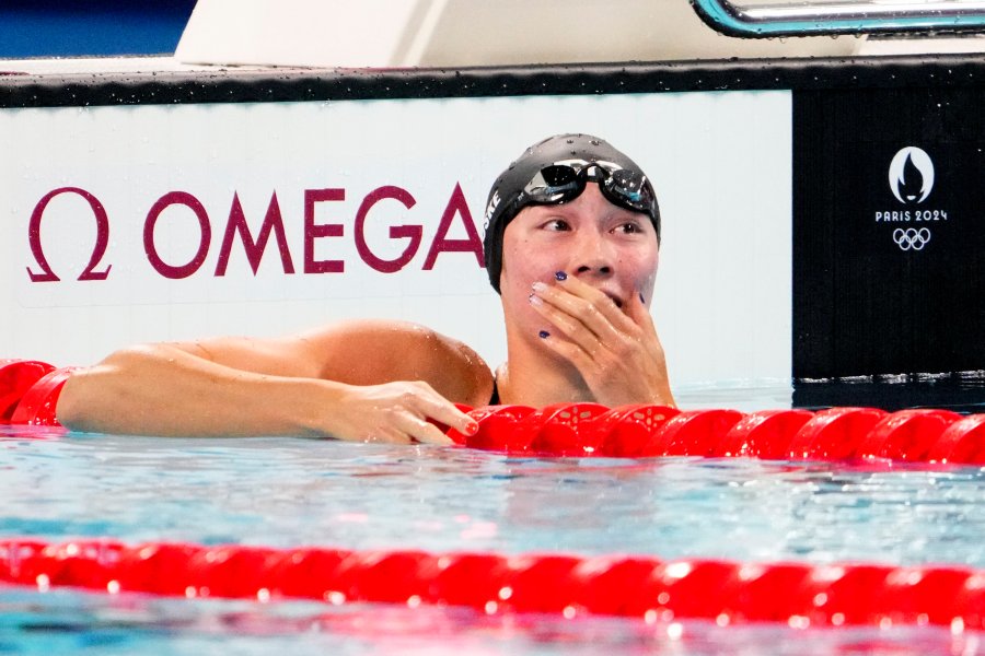 Torri Huske reacts after winning silver