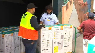 Qualifying senior citizens received free AC units at Monday’s Cool LA event.