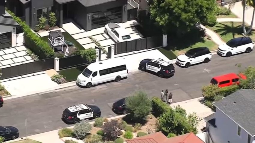 Police at the scene of a residential burglary Monday July 29, 2024 in Encino.