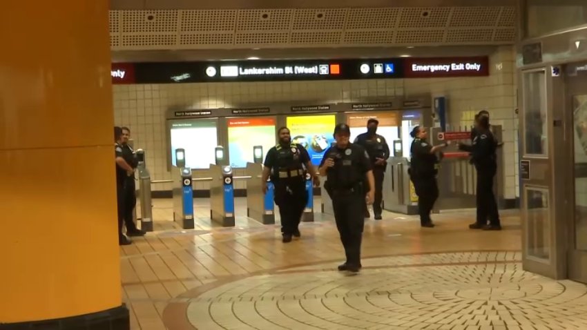 Law enforcement guard the Metro North Hollywood station on Wednesday, July 24, 2025.