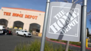 A sign is seen posted on the exterior of a Home Depot store on February 21, 2023 in El Cerrito, California. 