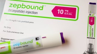 An injection pen of Zepbound, Eli Lilly’s weight loss drug, is displayed in New York City on Dec. 11, 2023.