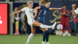 Maitane Lopez Millan #77 of Gotham FC defending battling Jordyn Huitema #9 of OL Reign for the ball during NWSL Cup Final game between NJ/NY Gotham City FC and OL Reign at Snapdragon Stadium on November 11, 2023 in San Diego, CA. 