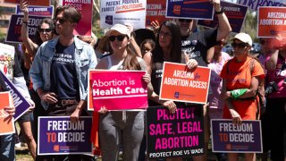 Members of Arizona for Abortion Access, the ballot initiative to enshrine abortion rights in the Arizona State Constitution, hold a press conference and protest condemning Arizona House Republicans and the 1864 abortion ban during a recess from a legislative session at the Arizona House of Representatives on April 17, 2024 in Phoenix, Arizona.