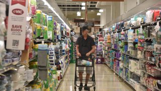 A customer shops at a supermarket on August 14, 2024 in Arlington, Virginia. 