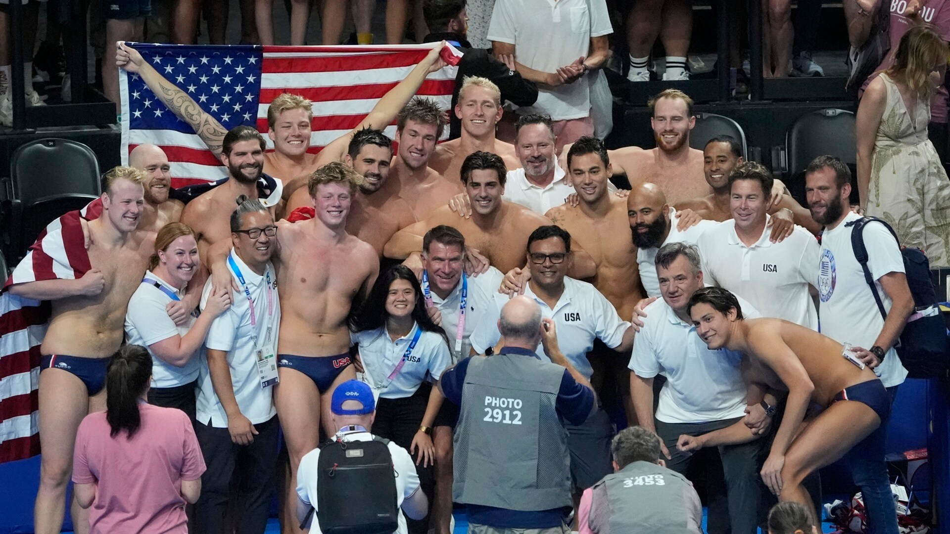 The U.S. men’s water polo team and coaches pose for a photo after defeating Hungary in the bronze medal match of the Paris Olympics. Team USA included Hannes Daube (Long Beach), Chase Dodd (Long Beach), Ryder Dodd (Long Beach), Ben Hallock (Westlake Village), Johnny Hooper (Pacific Palisades), Max Irving (Long Beach), Marko Vavic (Palos Verdes) and Adrian Weinberg (Rancho Palos Verdes).