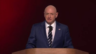 Sen. Mark Kelly stresses importance of defending democracy, standing with allies