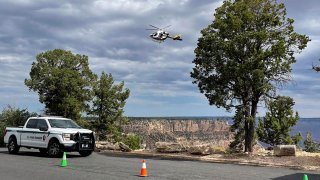 Helicopter flies above the Grand Canyon