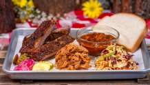 Hungry Bear Barbecue Jamboree - Smoked Barbecue Combo Platter: A selection of house-smoked meats, served with baked beans, house slaw, white bread, and pickles with a choice of two of the following: Pork Spareribs, Pulled Pork, Sausage Link, or Beef Brisket 

(Disneyland Resort/David Nguyen)