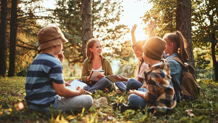 Children learning in an outdoor setting.