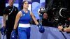 Who is Italian boxer Angela Carini and why did she quit her fight against Imane Khelif?