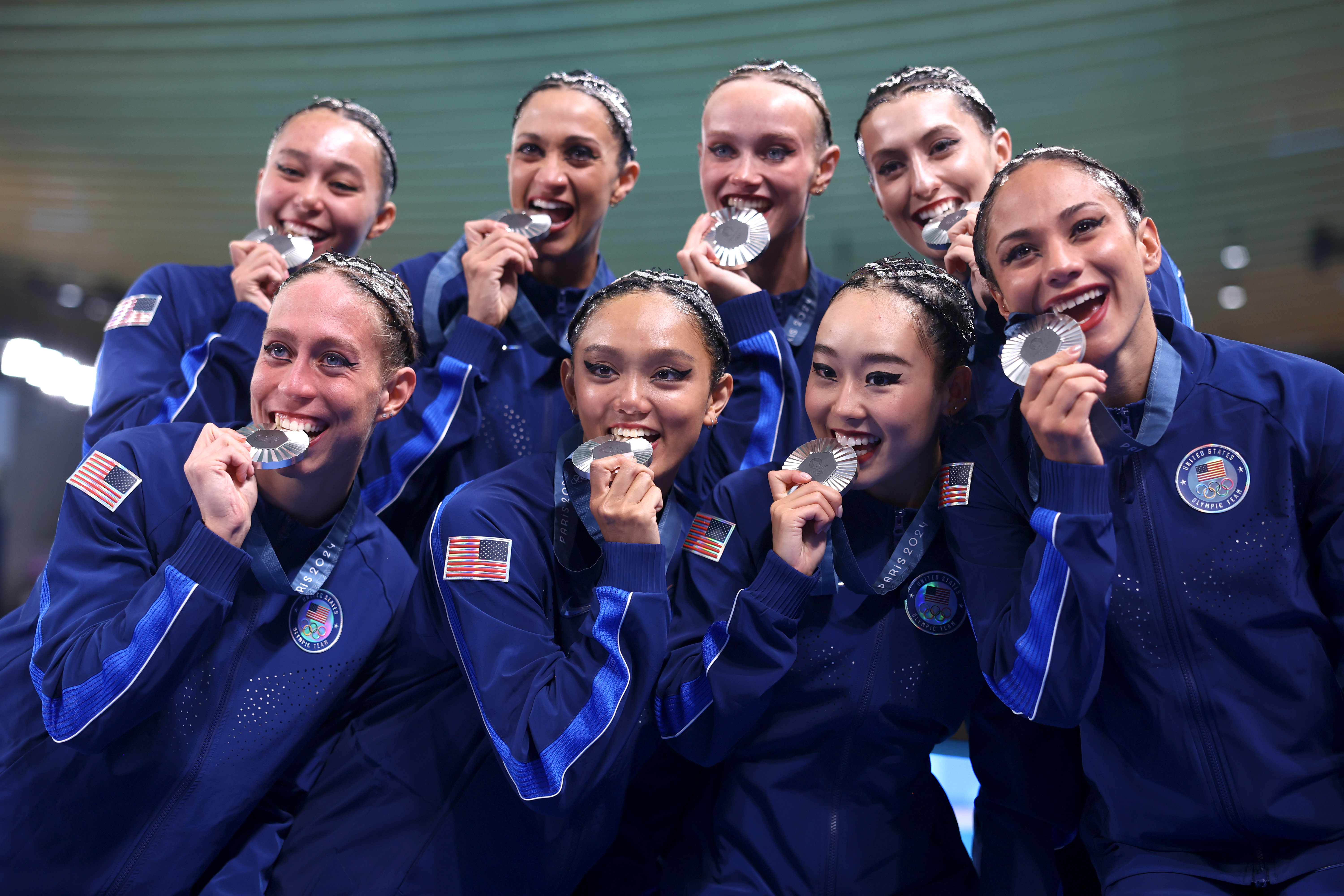 PARIS, FRANCE – AUGUST 07: Silver Medalists of Team United States pose following the Artistic Swimming medal ceremony after the Team Acrobatic Routine on day twelve of the Olympic Games Paris 2024 at Aquatics Centre on August 07, 2024 in Paris, France. Team USA won silver in artistic swimming team acrobat. Members include Anita Alvarez, of Santa Monica; Jaime Czarkowski, of Los Angeles; Megumi Field, of Cerritos; Daniella Ramirez, of UCLA, and Calista Liu, an alternate from Fullerton. (Photo by Maddie Meyer/Getty Images)