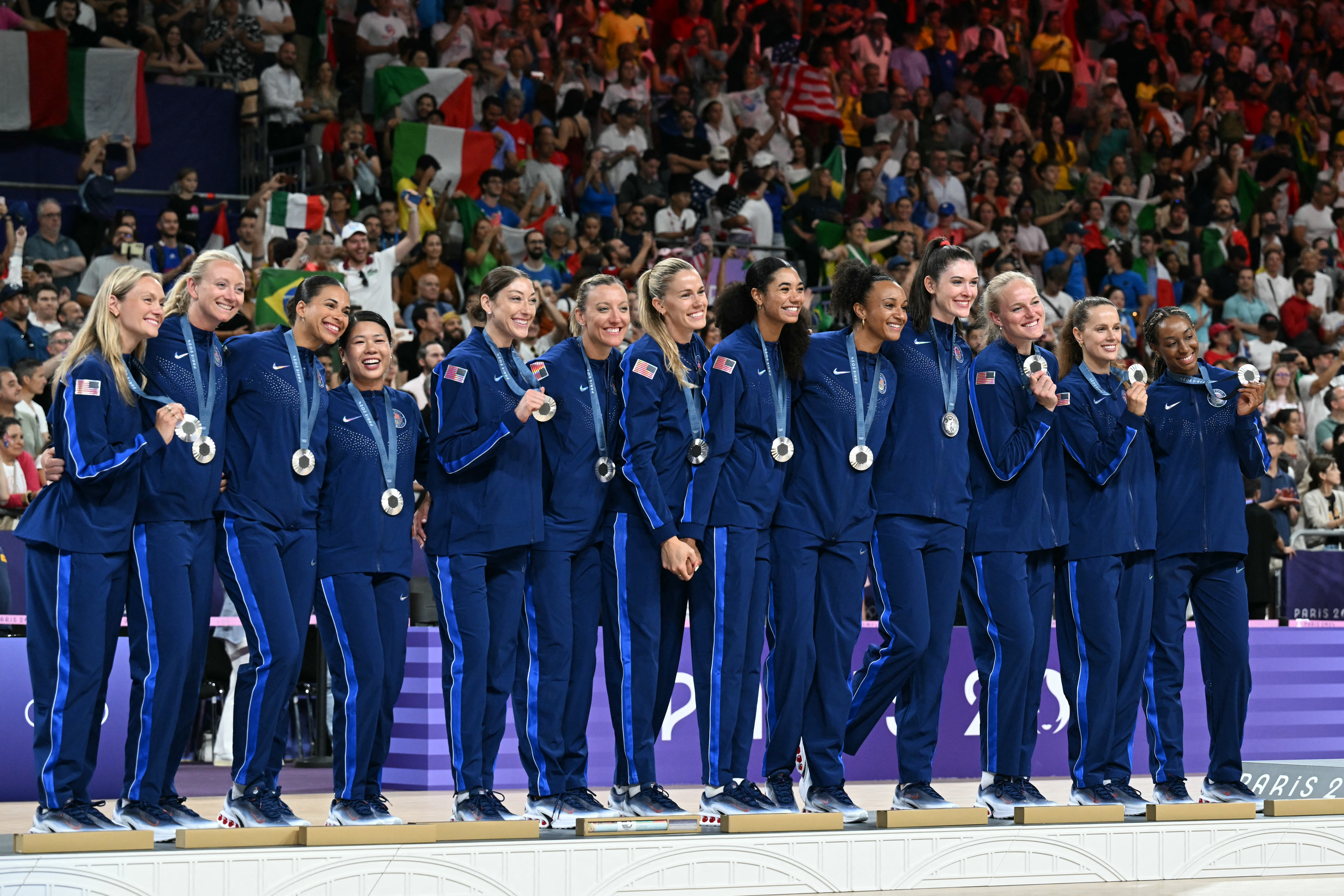 Team USA took home silver in women's volleyball at the Paris Olympics. The team included Khalia Lanier (USC), Kathryn Plummer (Aliso Viejo), Kelsey Robinson Cook (Manhattan Beach), Justine Wong-Orantesn (Cypress) and Coach Karch Kiraly (Santa Barbara).