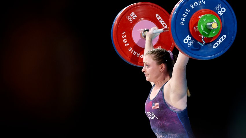 Olivia Reeves lifts weights at Paris Olympics for the gold medal