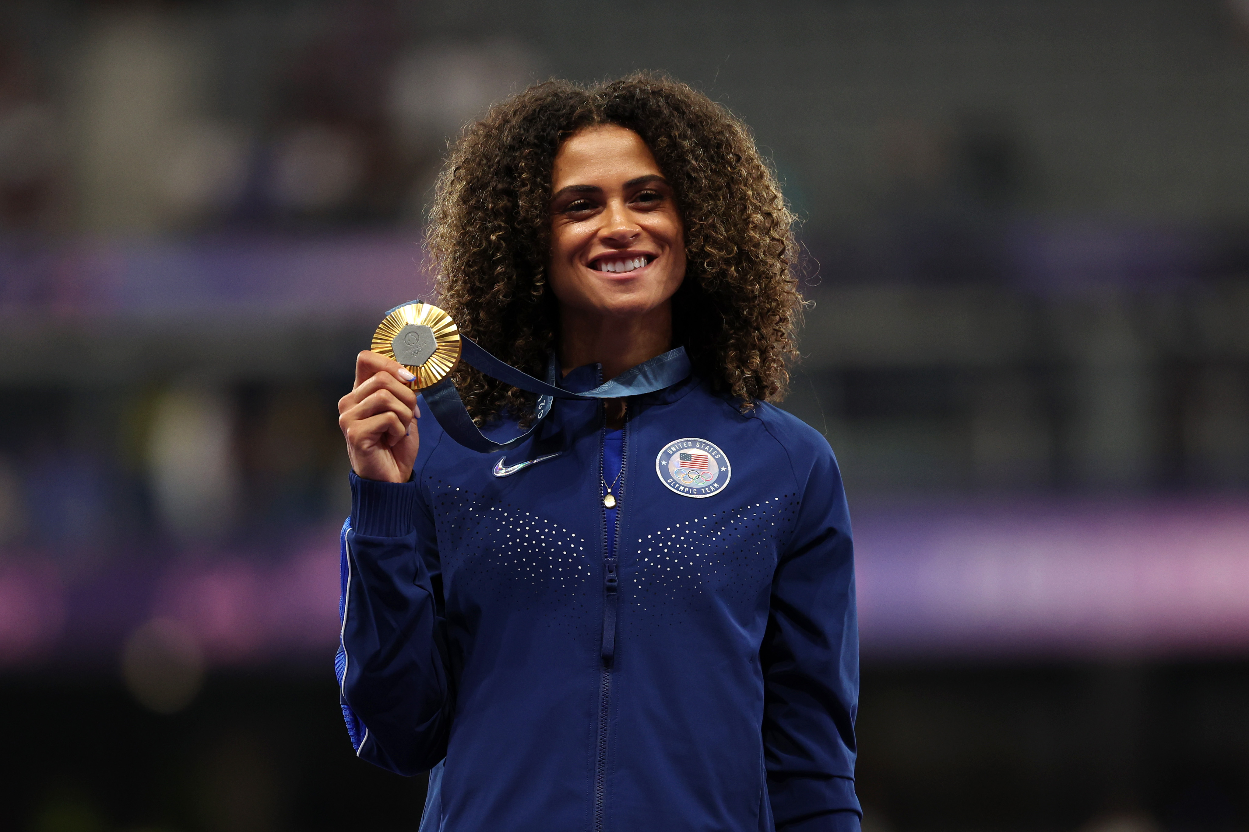 Sydney McLaughlin-Levrone, of Los Angeles, cruised to a world record in winning gold in the 400m hurdles.