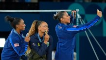 (Left to right) Simone Biles of the United States, Rebeca Andrade of Brazil, and Jordan Chiles of the United States