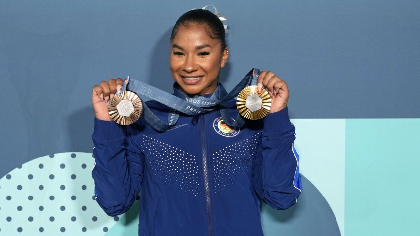 Jordan Chiles of the United States poses for a photo with her gold and bronze medasl after day three of the gymnastics event finals during the Paris 2024 Olympic Summer Games. Mandatory Credit: Kyle Terada-USA TODAY Sports