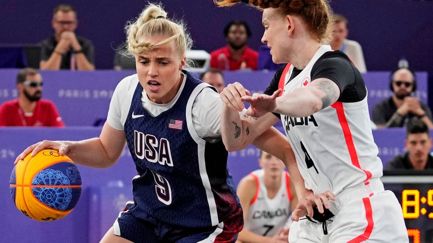 Aug 5, 2024; Paris, France; United States player Hailey van Lith (9) drives to the basket against Canada player Kacie Bosch (4) in the women’s 3×3 basketball bronze medal game during the Paris 2024 Olympic Summer Games at La Concorde 1.