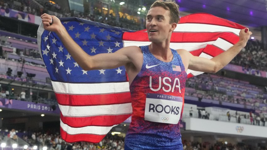 Kenneth Rooks holds American flag