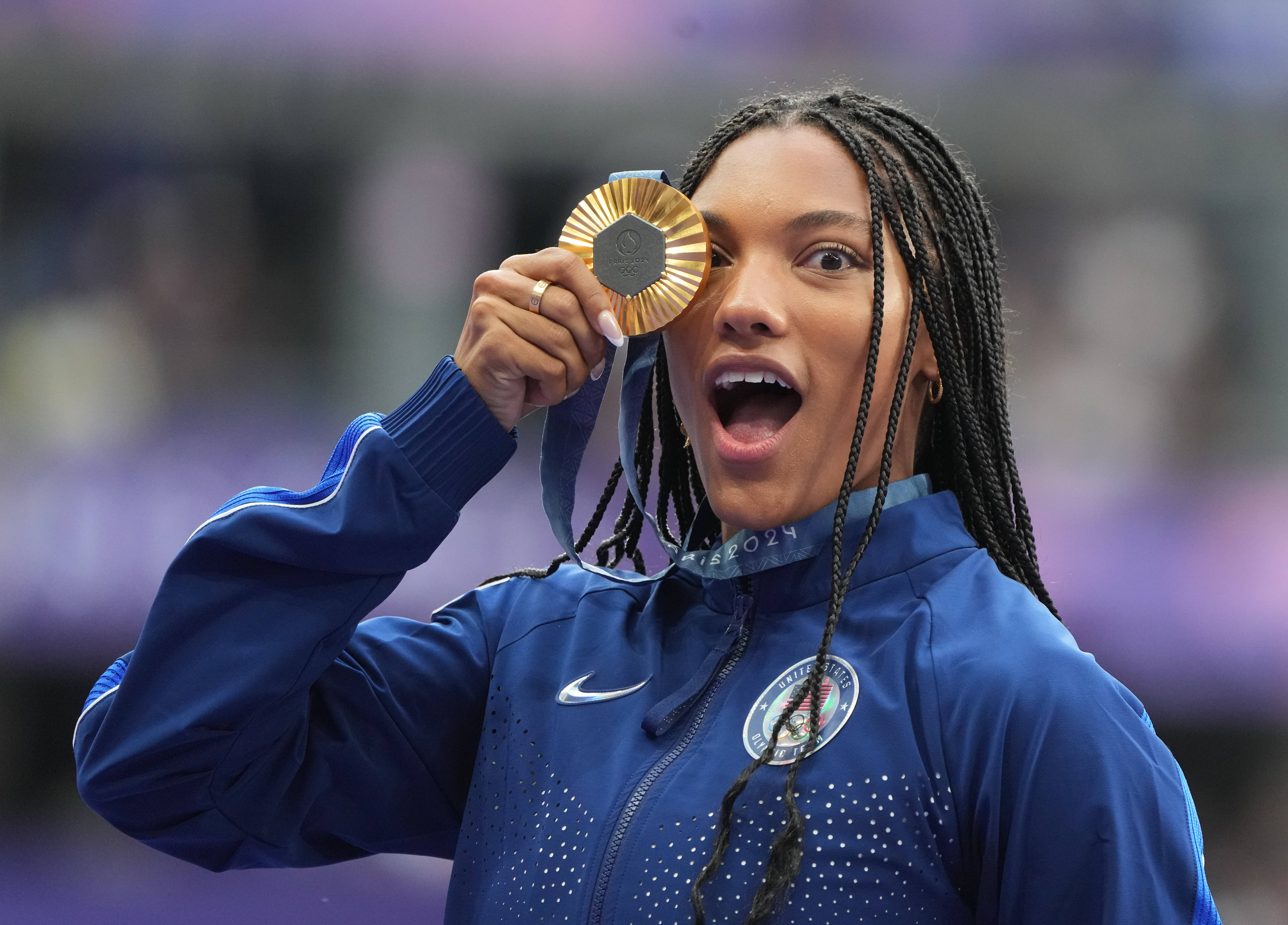 Tara Davis-Woodhall, of Agoura Hills, won gold in the long jump at the Paris 2024 Olympic Summer Games at Stade de France.