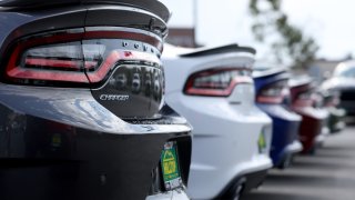 Brand new Dodge Charger cars are displayed on the sales lot at Hilltop Chrysler Jeep Dodge Ram on August 17, 2022 in Richmond, California.