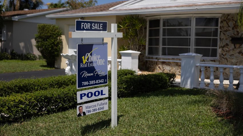 A ‘For Sale’ sign advertises a home for sale on April 20, 2023, in Cutler Bay, Florida.