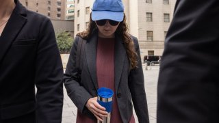 Caroline Ellison, former chief executive officer of Alameda Research LLC, center, arrives at court in New York, US, on Tuesday, Oct. 10, 2023. 