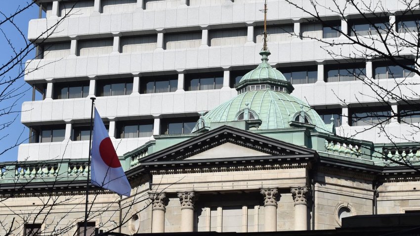 The Bank of Japan headquarters is seen in Tokyo on January 30, 2017. The Bank of Japan will pull the plug on its eight-year negative interest rate policy in April, according to more than 80% of economists polled by Reuters, marking a long-awaited major shift from a global outlier central bank.