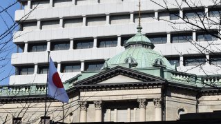The Bank of Japan headquarters is seen in Tokyo on January 30, 2017. The Bank of Japan will pull the plug on its eight-year negative interest rate policy in April, according to more than 80% of economists polled by Reuters, marking a long-awaited major shift from a global outlier central bank.
