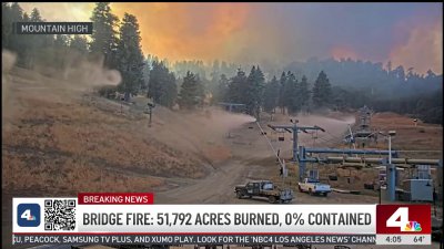 Bridge Fire burns dozens of homes and cabins