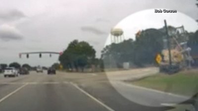 WATCH: Train collides with 18-wheeler carrying a tank