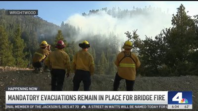 Mandatory evacuations remain in place as Bridge Fire continues to burn