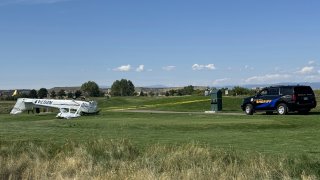 Small plane crashed and landed upside down on a Denver-area golf course.