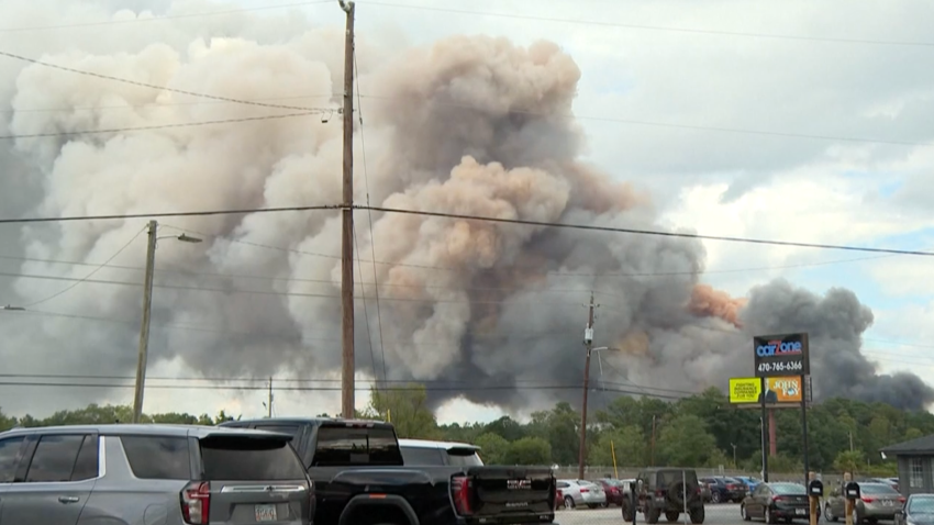 A huge fire at a chemical plant near Atlanta tonight has forced people out of their homes and shut down a major interstate. With questions now over just how safe that air is to breathe.