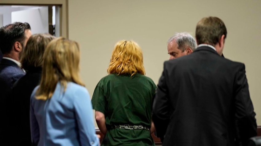 The teenage suspect accused of a deadly shooting at Apalachee High School leaves the Barrow County courthouse after his first appearance, on Sept. 6, 2024, in Winder, Georgia.